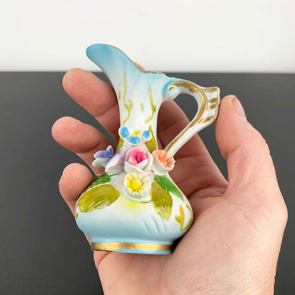 Miniature Victorian style jug ornament with applied floral decoration