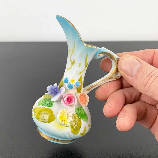 Miniature Victorian style jug ornament with applied floral decoration