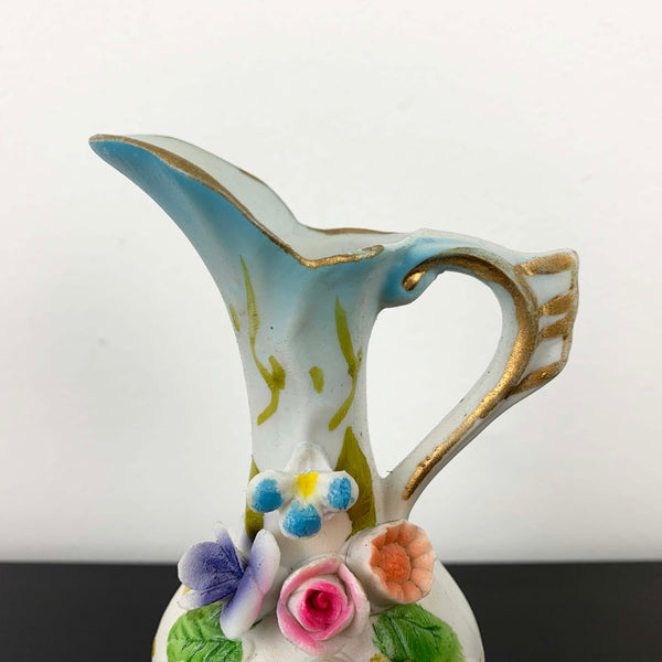 Miniature Victorian style jug ornament with applied floral decoration
