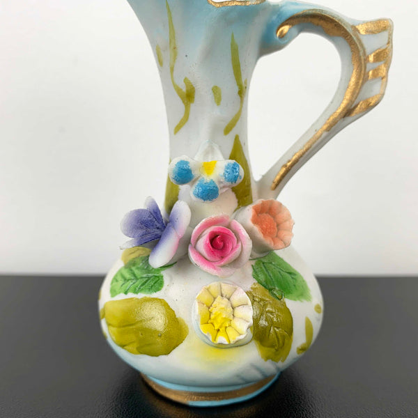 Miniature Victorian style jug ornament with applied floral decoration