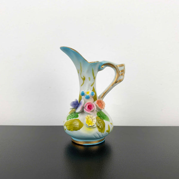 Miniature Victorian style jug ornament with applied floral decoration