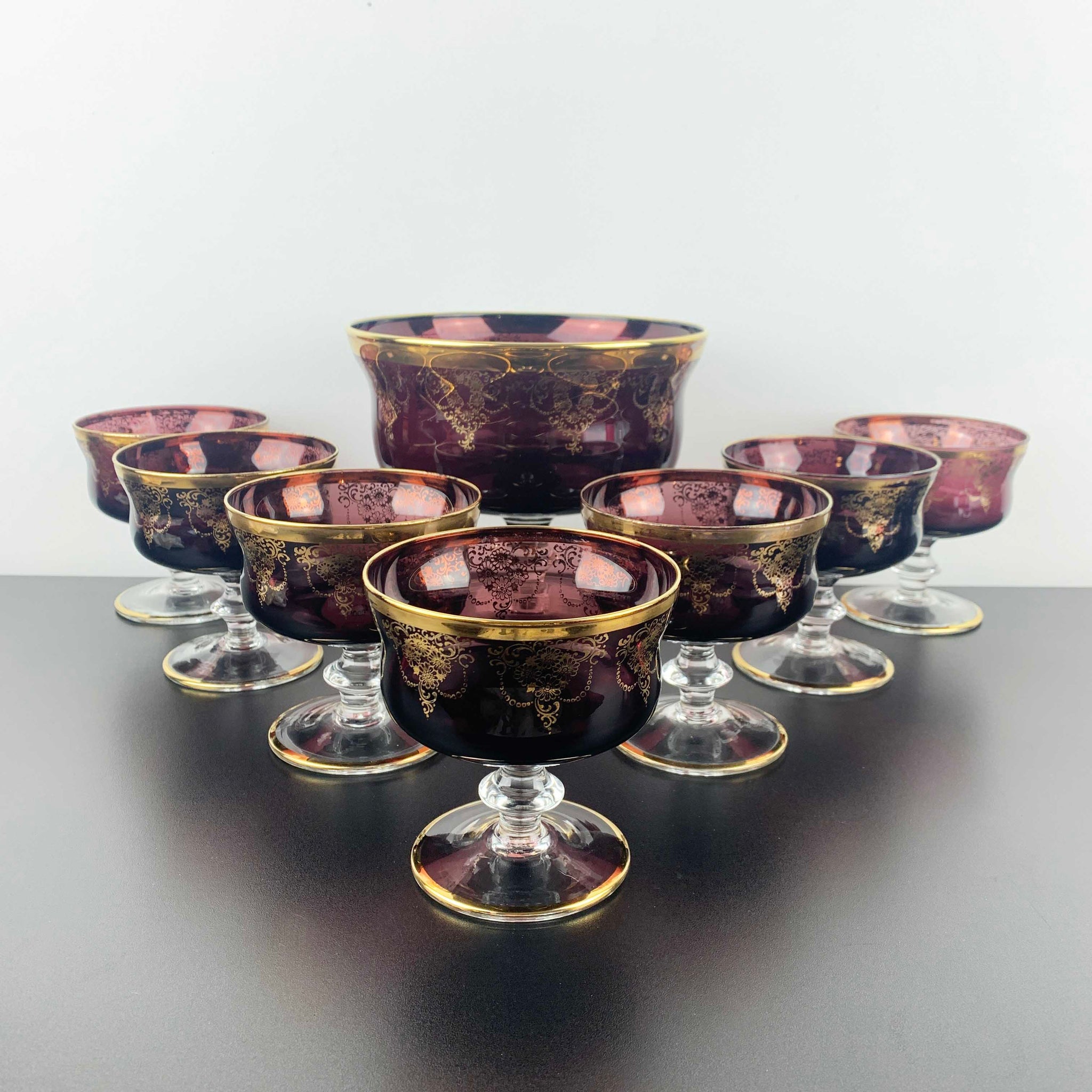 Murano 8 piece dessert bowl set in amethyst glass with gold gilt detail