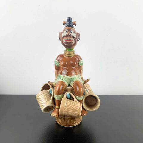 Mid century African Zulu style collectible decanter with shot cups