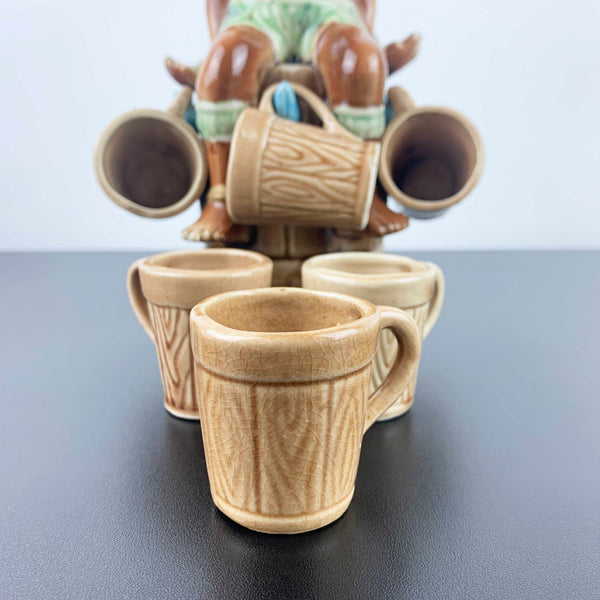 Mid century African Zulu style collectible decanter with shot cups