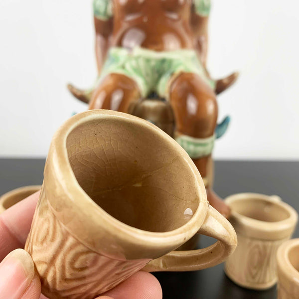 Mid century African Zulu style collectible decanter with shot cups