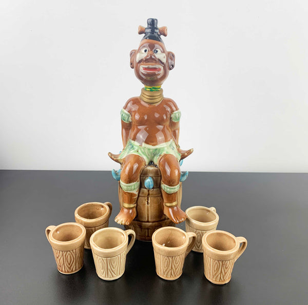 Mid century African Zulu style collectible decanter with shot cups