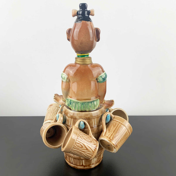 Mid century African Zulu style collectible decanter with shot cups