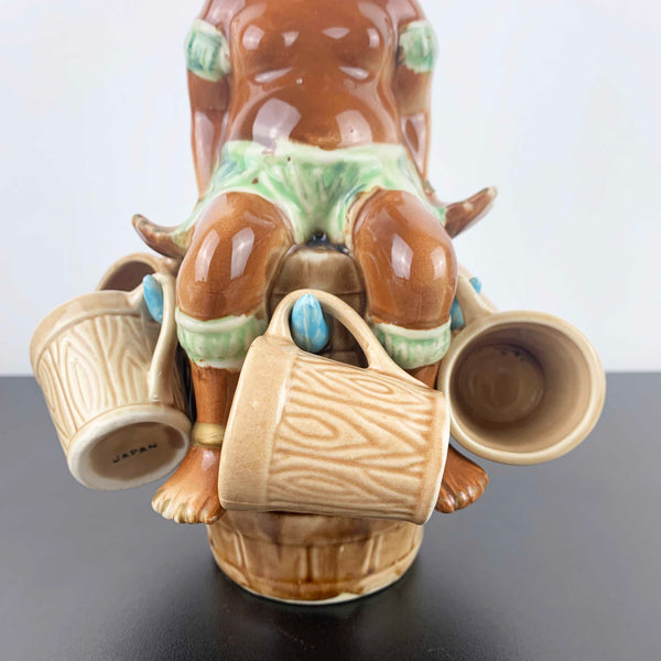 Mid century African Zulu style collectible decanter with shot cups