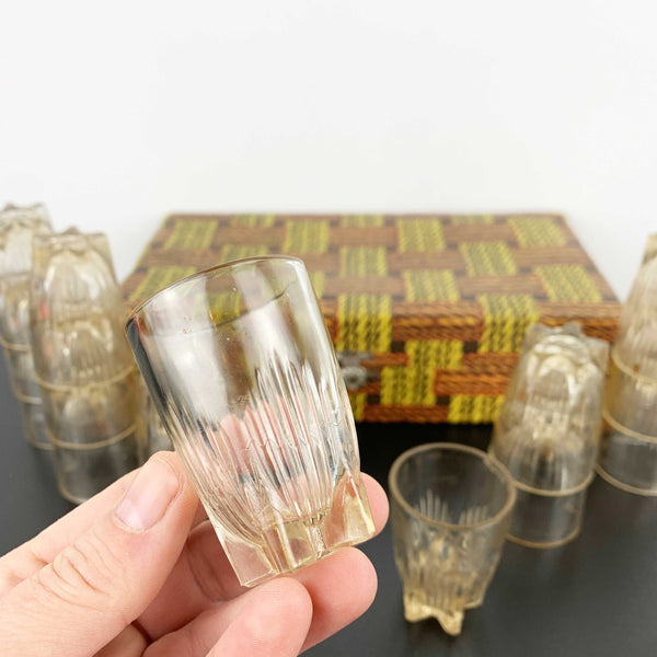 Vintage set of 18 small shot glasses in case