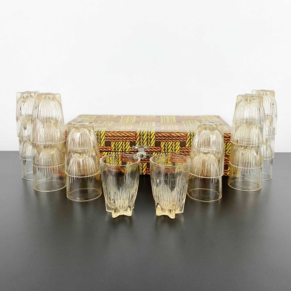 Vintage set of 18 small shot glasses in case