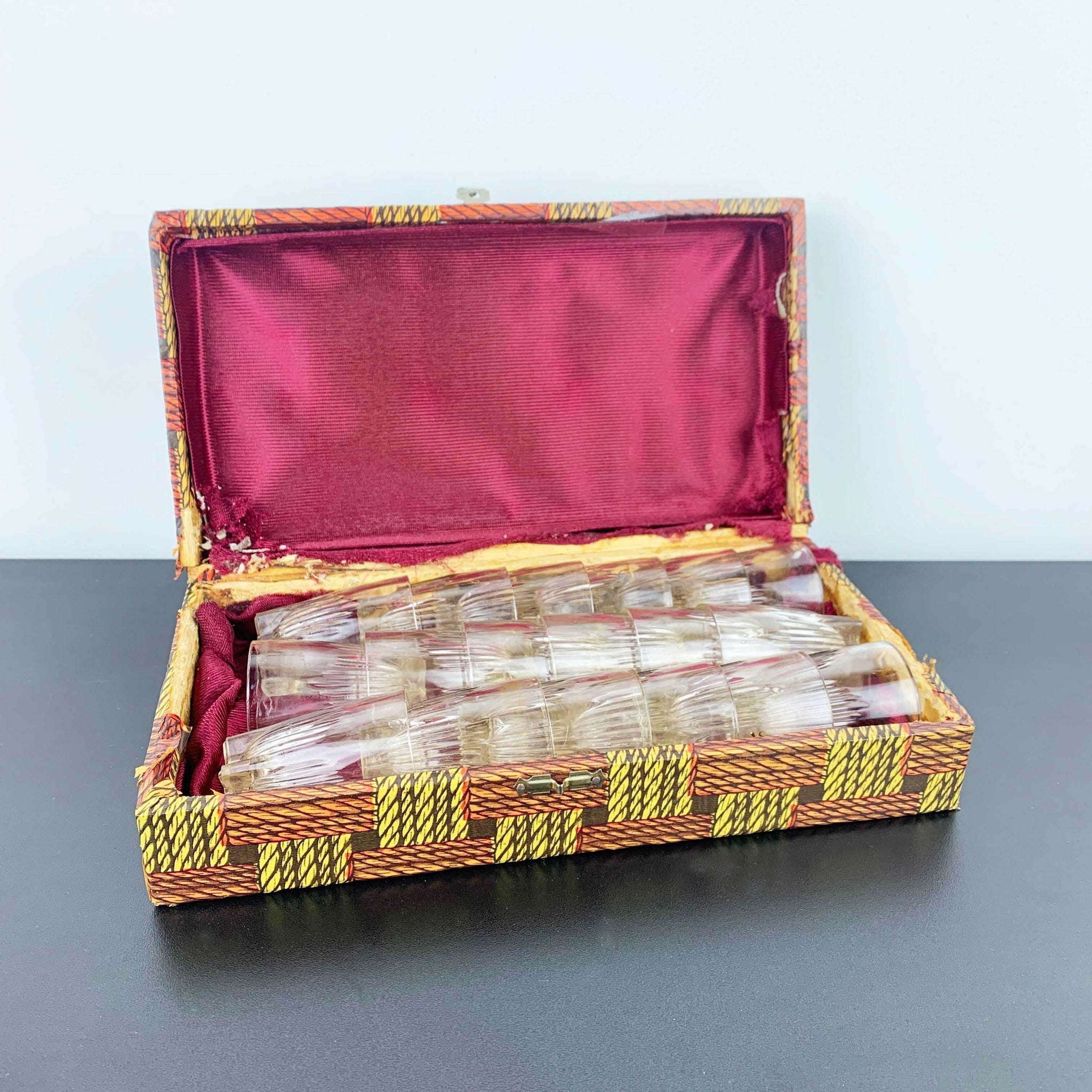 Vintage set of 18 small shot glasses in case