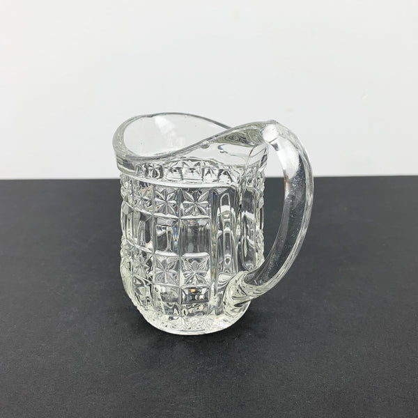 Small diamond cut glass creamer