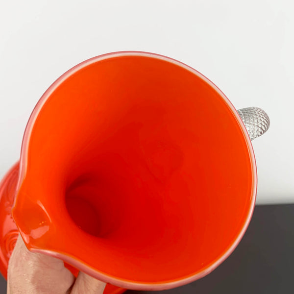 Stelvia Glass Empoli Orange Pitcher with Twist Handle and Swirl Pattern Detail