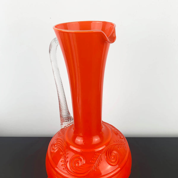 Stelvia Glass Empoli Orange Pitcher with Twist Handle and Swirl Pattern Detail