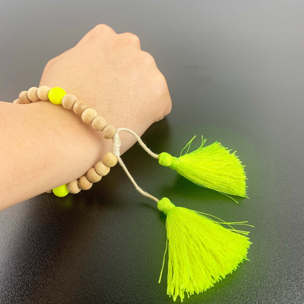 Talisman natural wood beads and neon yellow adjustable tassel bracelet