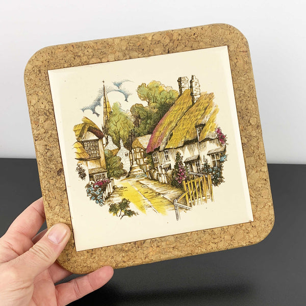 Thatched cottage village scene tile trivet with cork surround