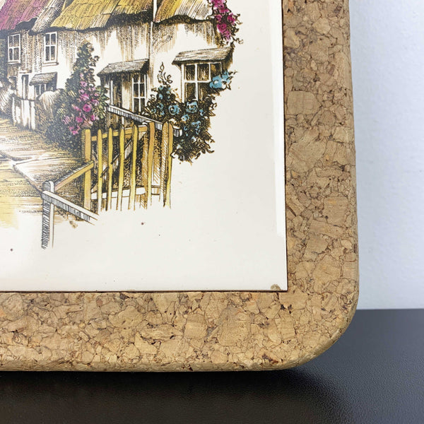 Thatched cottage village scene tile trivet with cork surround